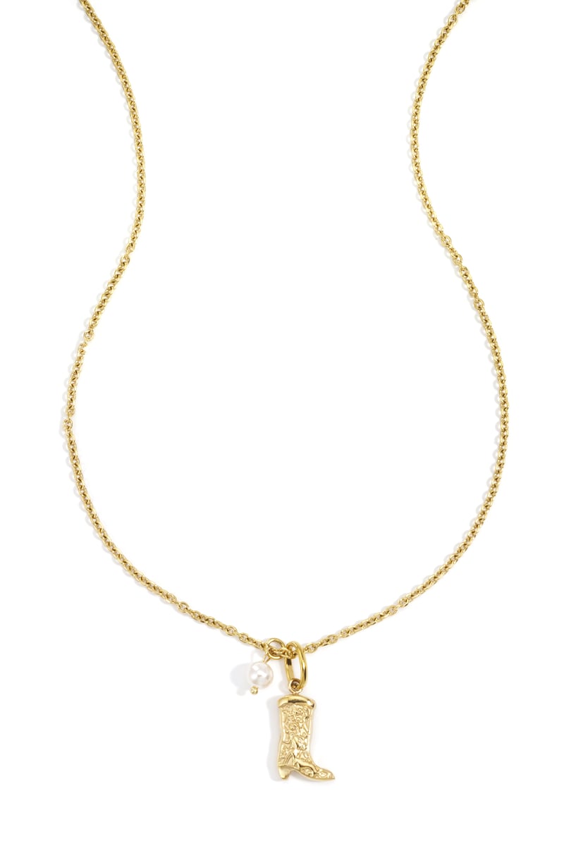 close-up of boot pendant necklace detail
