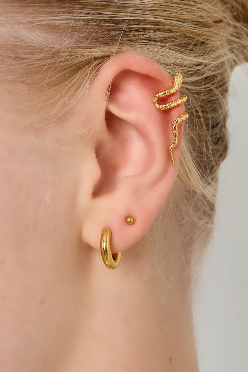 copper snake ear cuff worn on ear