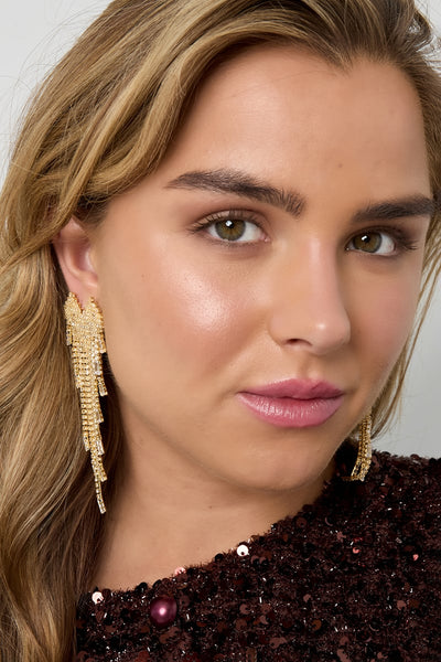 copper geometric dangle earrings worn