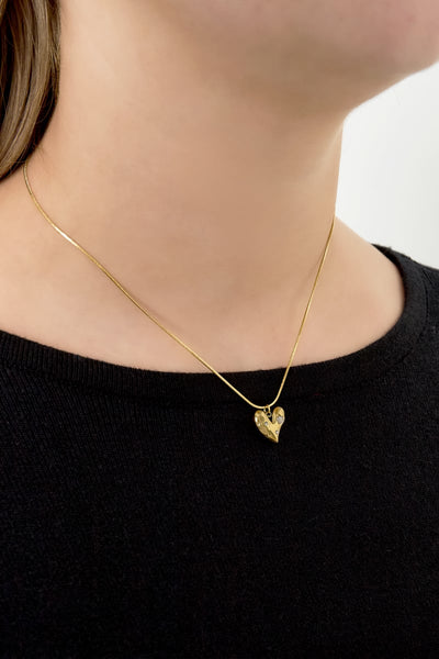 close-up heart pendant of Lucky to Have You necklace with rhinestones